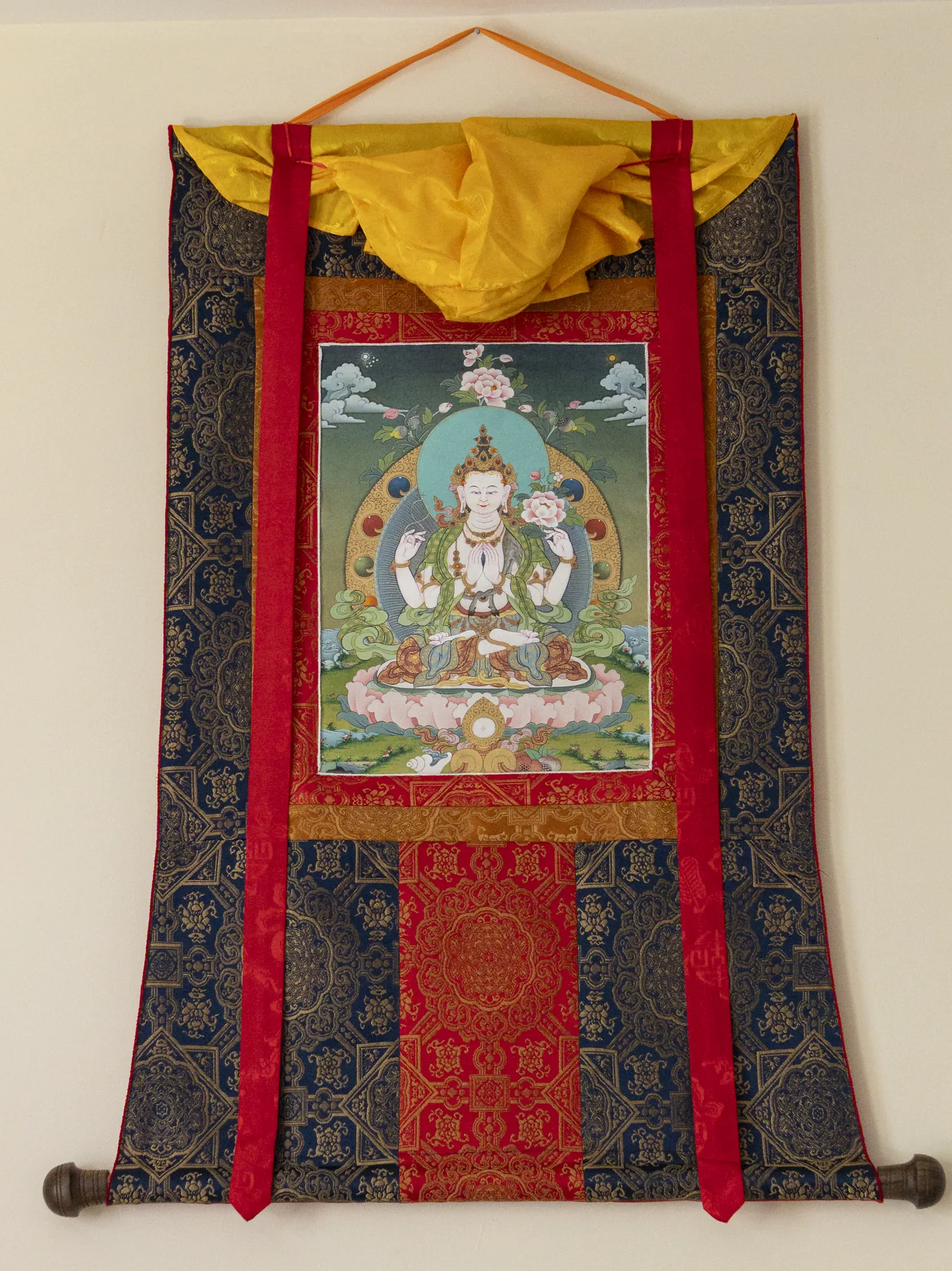 Smaller Four-Armed Chenrezig thangka with full brocade mount